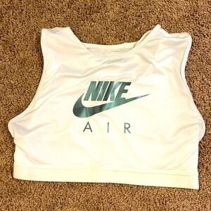 Double layer Nike sports bra with mesh overlay. New without tags.